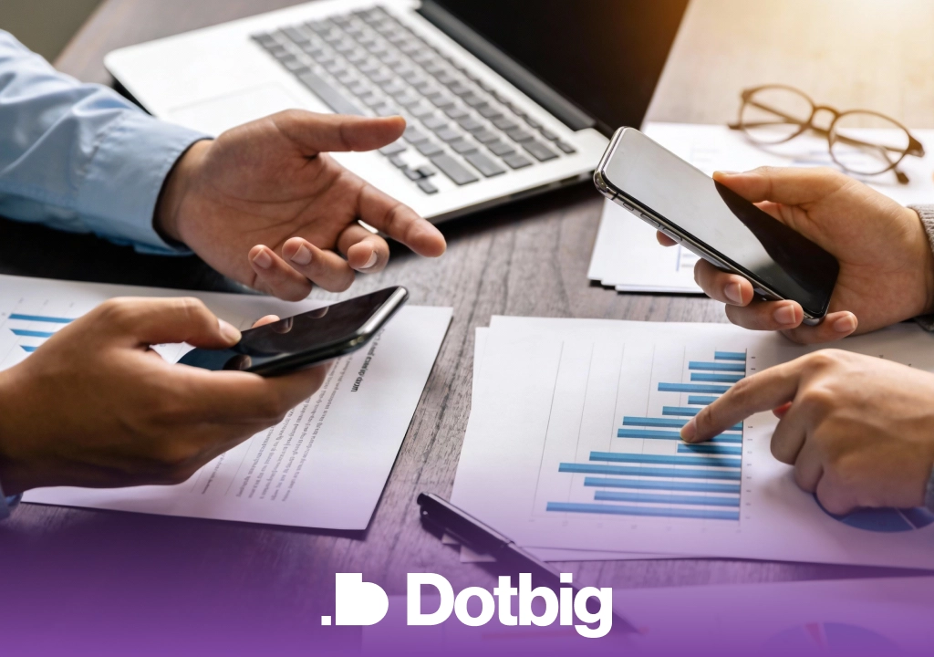 Dotbig investors reviewing reports and mobile data